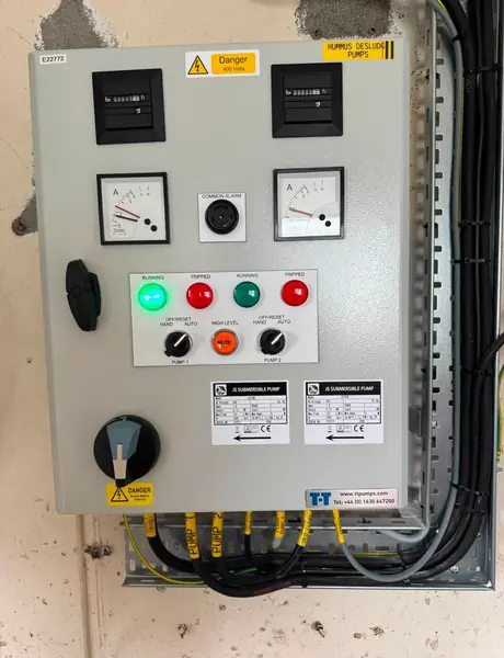 Commercial control panel with switches and gauges installed in Cornwall