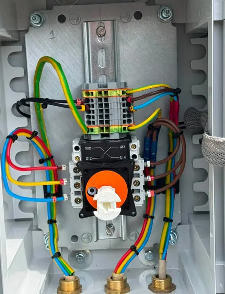Rotary isolator wiring inside an electrical enclosure